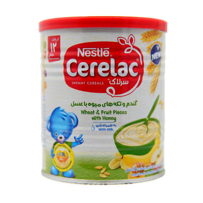 سرلاک گندم و تکه های میوه با عسل به همراه شیر نستله ۴۰۰ گرمی